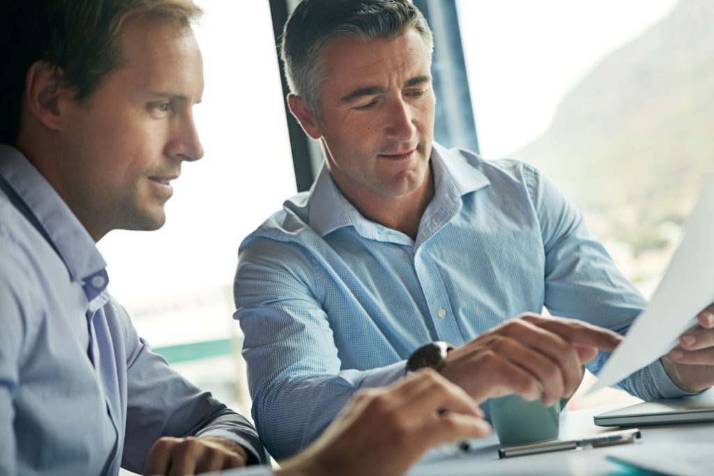 HVAC Business Coach offering personalized coaching to a client, discussing strategies and improvements for business growth.